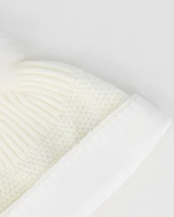 BRUGI - Berretto bianco a maglia da donna con pon pon, strass e fodera in pile