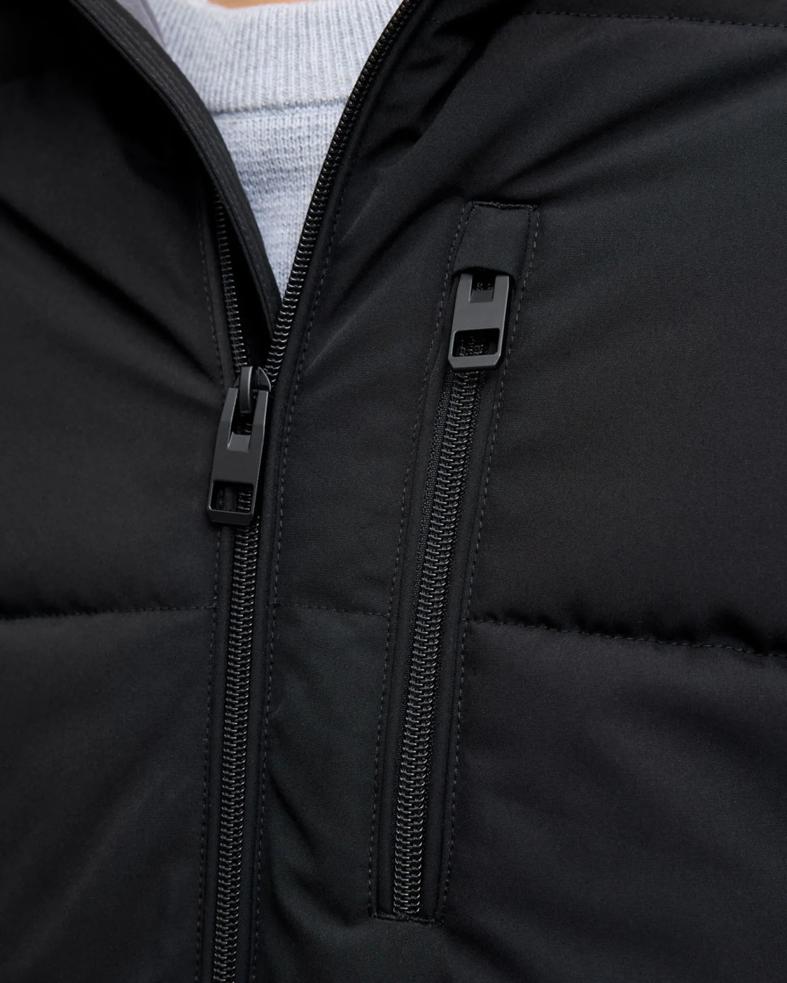 JACK & JONES - PIUMINO NERO DA UOMO IDROREPELLENTE CON CAPPUCCIO