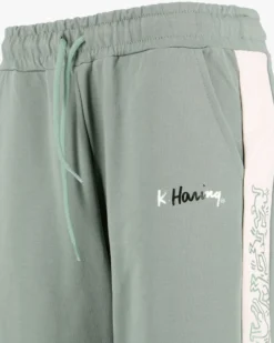 KEITH HARING - Pantalone con bande Mylar verde salvia da donna in cotone