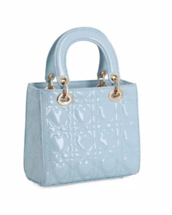 NARDINI - Borsa piccola celeste due manici effetto vernice trapuntata con cuori e ciondoli, tracolla removibile