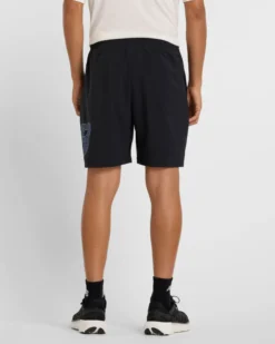 NEW BALANCE - PANTALONCINO UOMO NERO E CELESTE ESSENTIALS LINED GRAPHIC - MS41238BM