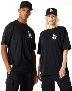 NEW ERA - T shirt oversize nera in cotone con logo bianco