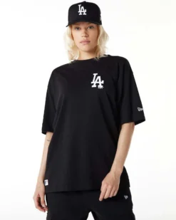NEW ERA - T shirt oversize nera in cotone con logo bianco