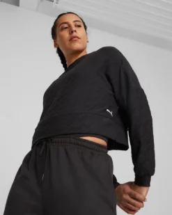 PUMA - Felpa crop da donna nera in tessuto traspirante