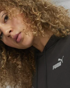 PUMA - Felpa da donna relaxed fit nera con cappuccio