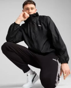 PUMA - GIUBBINO CON CAPPUCCIO FULL ZIP NERO ESSENTIAL REGULAR WINDBREA  DA UOMO,  684625-01