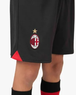 PUMA - Pantaloncini da calcio bambino neri e rossi in tessuto traspirante con logo Milan