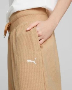 PUMA - Pantalone da donna beige a palazzo con elastico in vita e lacci