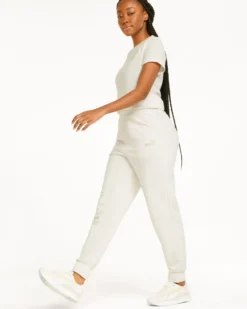 PUMA - Pantalone da donna panna a vita alta