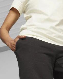PUMA - Pantalone tuta da donna a gamba dritta nero con logo bianco