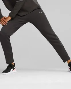 PUMA - Pantalone tuta da donna a vita alta nero in tessuto traspirante
