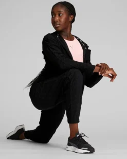 PUMA - Pantalone tuta da donna nero in tessuto traspirante