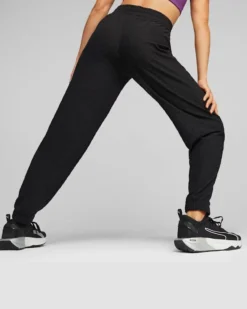 PUMA - Pantalone tuta da donna nero in tessuto traspirante