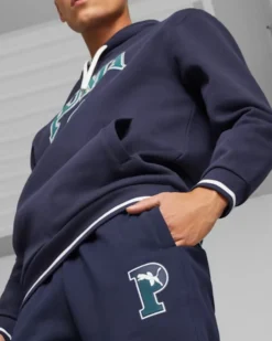 PUMA - Pantalone tuta da uomo blu con logo verde scuro