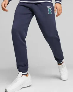 PUMA - Pantalone tuta da uomo blu con logo verde scuro