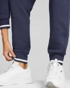 PUMA - Pantalone tuta da uomo blu con logo verde scuro