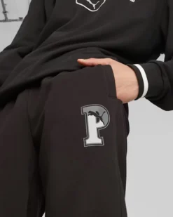 PUMA - Pantalone tuta da uomo nero con logo verde bianco