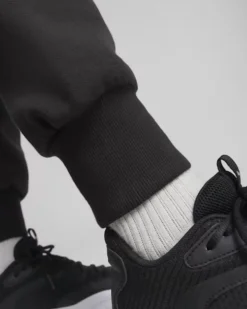PUMA - Pantalone tuta nero da uomo con stampa laterale