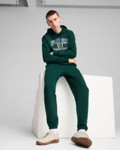 PUMA - PANTALONE TUTA  VERDE SPORTS LEGACY GRAPHIC DA UOMO, 629631-60