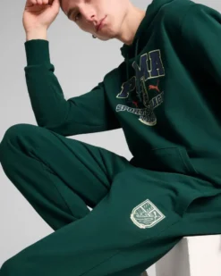 PUMA - PANTALONE TUTA  VERDE SPORTS LEGACY GRAPHIC DA UOMO, 629631-60