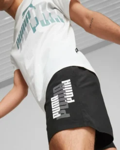 PUMA - Pantaloni corti da uomo neri con logo bianco e grigio