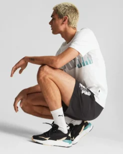 PUMA - Pantaloni corti da uomo neri con logo bianco e grigio