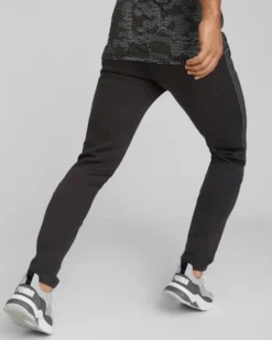 PUMA - Pantaloni tuta da uomo neri slim fit in tessuto traspirante