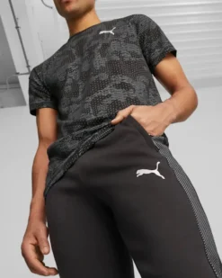 PUMA - Pantaloni tuta da uomo neri slim fit in tessuto traspirante