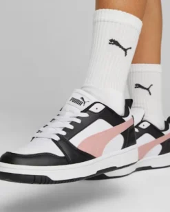 PUMA - Sneaker da donna bianca e nera con logo rosa - REBOUND V6 LOW