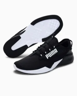PUMA - Sneaker da uomo nera e bianca in mesh traspirante con soletta in memory foam - RETALIATE 2