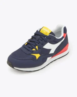 PUMA - Sneakers blu e bianca con dettagli rossi e gialli, numerata 36/39 - N 92 GS