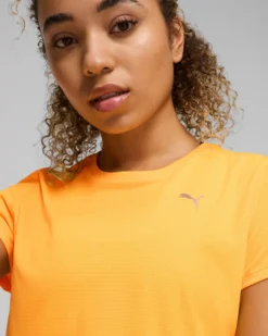 PUMA - T-SHIRT DA DONNA ARANCIONE FLUO RUN FAVORITES VELOCITY- 525061-38