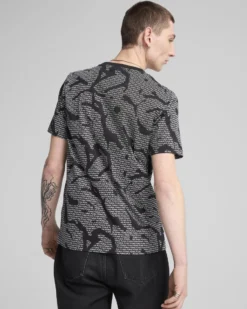 PUMA - T-SHIRT NERA ESS LOGO LAB AOP TEE DA UOMO - 684668-01