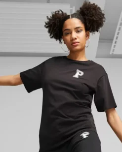 PUMA - T shirt relaxed fit da donna nera con logo bianco