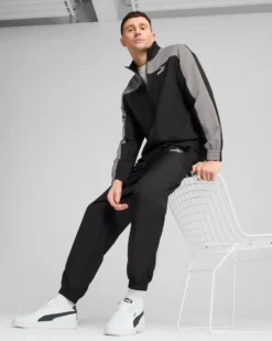 PUMA -TUTA COMPLETA NERA E GRIGIA FULL ZIP IN MICROFIBRA WOVEN COLORBLOCK TRACKSUIT  DA UOMO, 684856-01