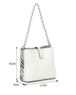 RIFLE - Minibag zebrata con tre scomparti principali e pattina con chiusura a girello, tracolla removibile