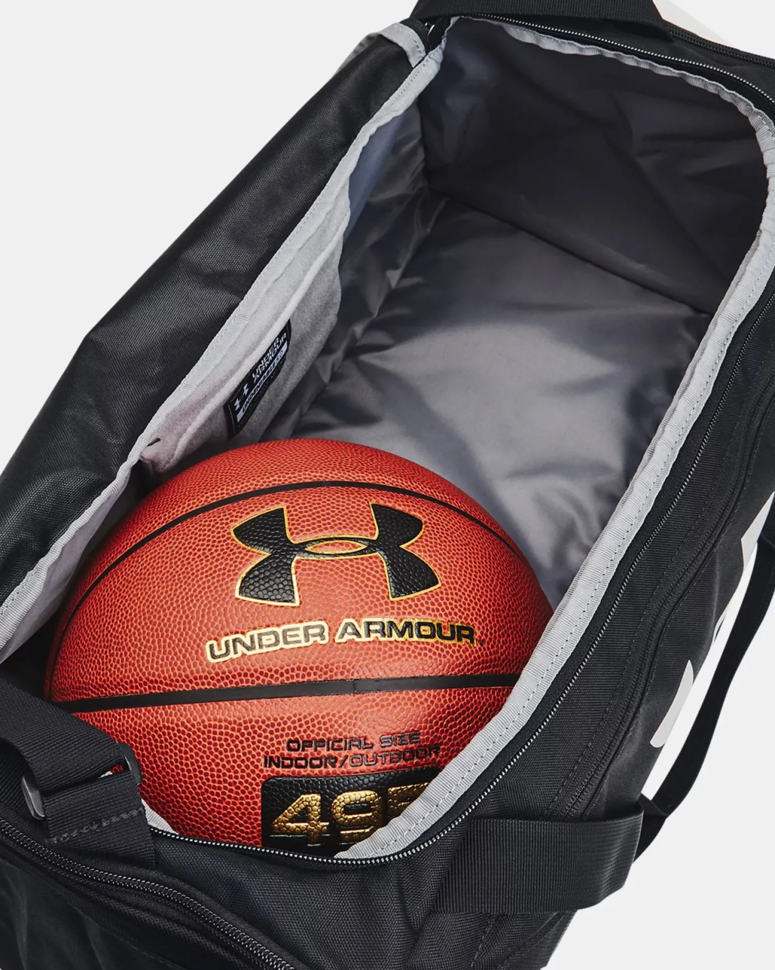 UNDER ARMOR - Borsone nero impermeabile con tasca frontale e logo bianco