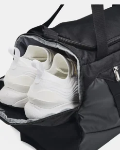 UNDER ARMOR - Borsone nero impermeabile con tasca frontale e logo bianco