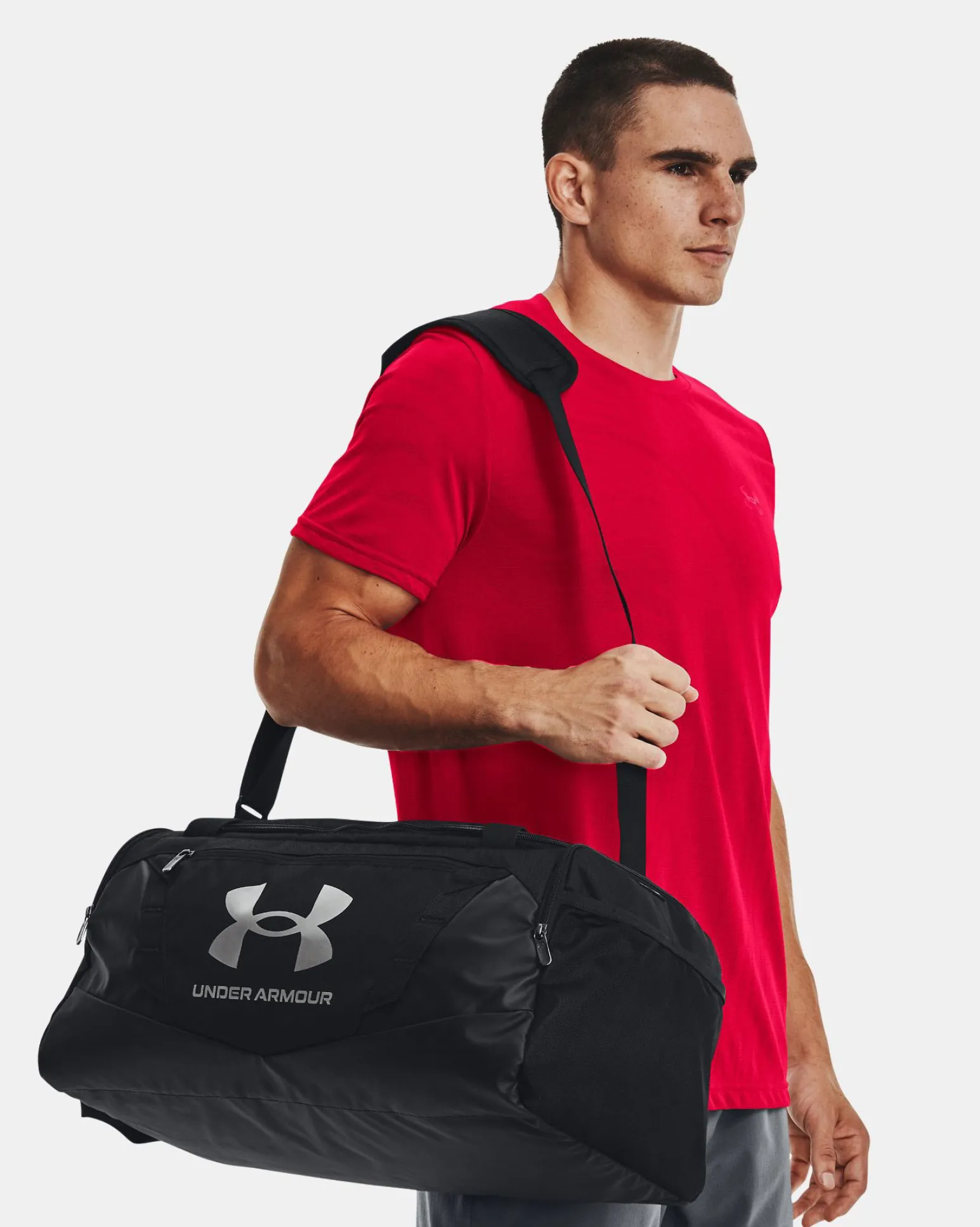 UNDER ARMOR - Borsone nero impermeabile con tasca frontale e logo bianco
