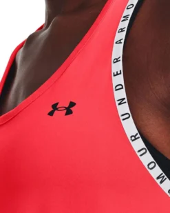 UNDER ARMOUR - Canotta da donna rossa e bianca in tessuto traspirante con logo nero